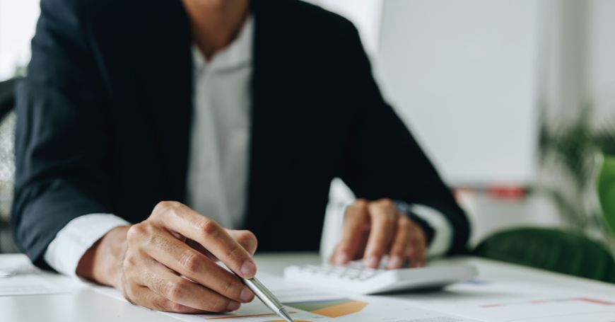 Business professional analyzing financial reports in preparation for the Spanish tax year
