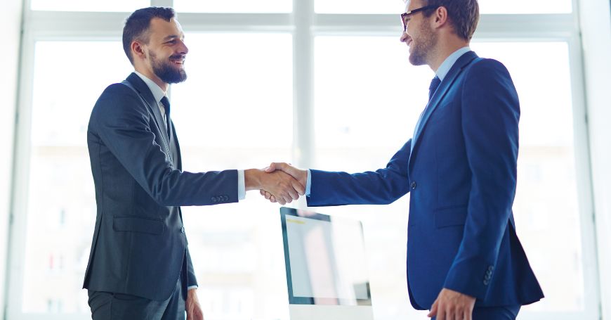 British entrepreneur sealing a deal, representing buying a business in spain after brexit